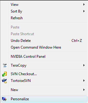 Right click on an empty space on your desktop and select Personalize